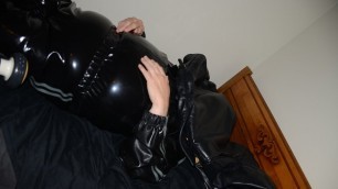 Jun 15 2022 - Rubber Boy gets smothered in leather while tied up in latex