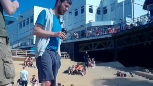 Hands in Pants at the Beach Steps Shameless Male Adjustment Trackies Brit