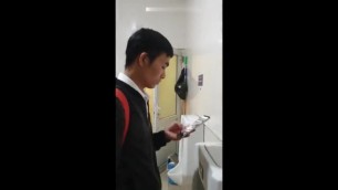 Males are pissing in the toilet 15.